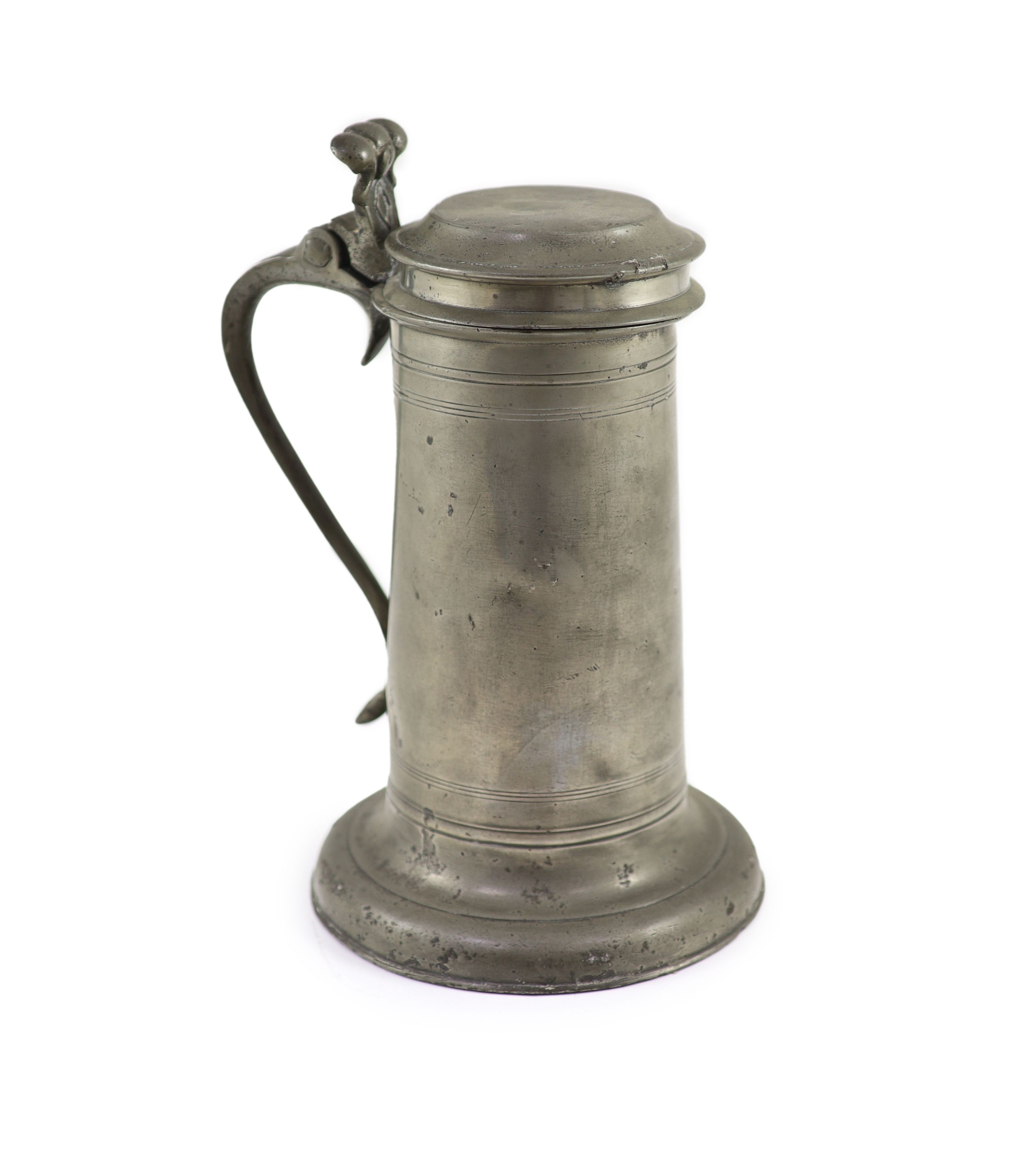 A mid-17th century pewter flagon of large proportions H 31cm.